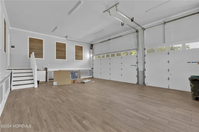 a view of a livingroom with wooden floor