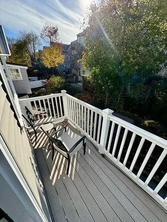 a view of a chairs setting on the roof deck
