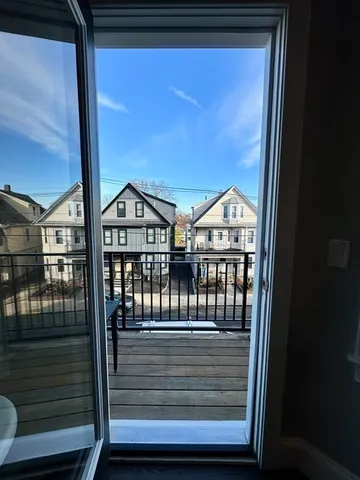 a view of a balcony with a door