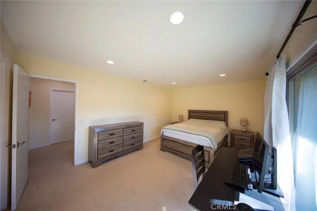 a view of room with furniture and windows