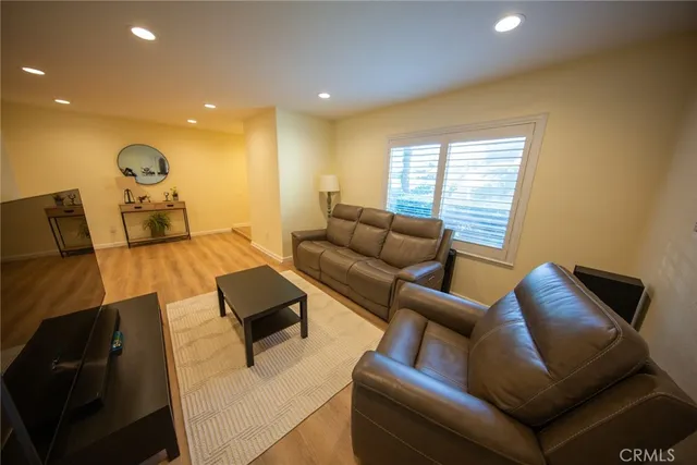 a living room with furniture and a couch