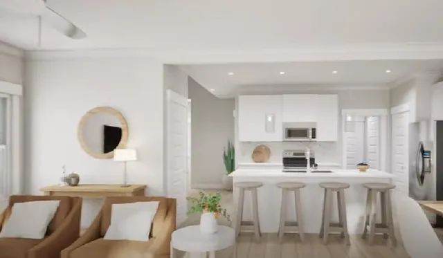 a living room with furniture a rug and white appliances