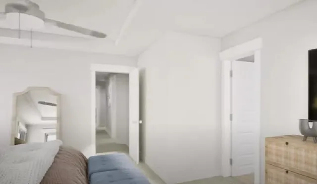 a living room with furniture and a walk in closet