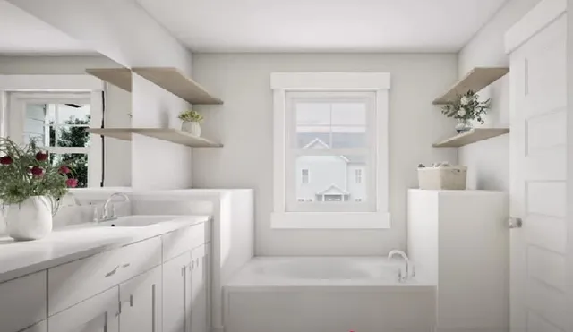 a bathroom with a bathtub sink and mirror