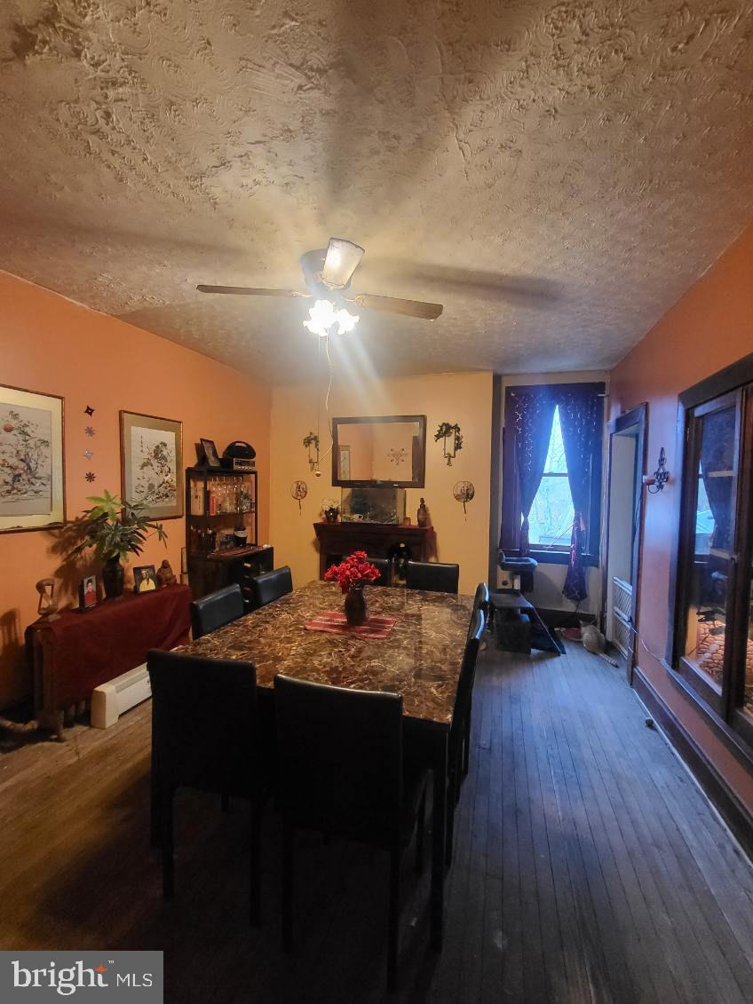 413 Delaware Street Monessen, PA 15062 - Photo 8 of 19 Charming dining space with warm hues.