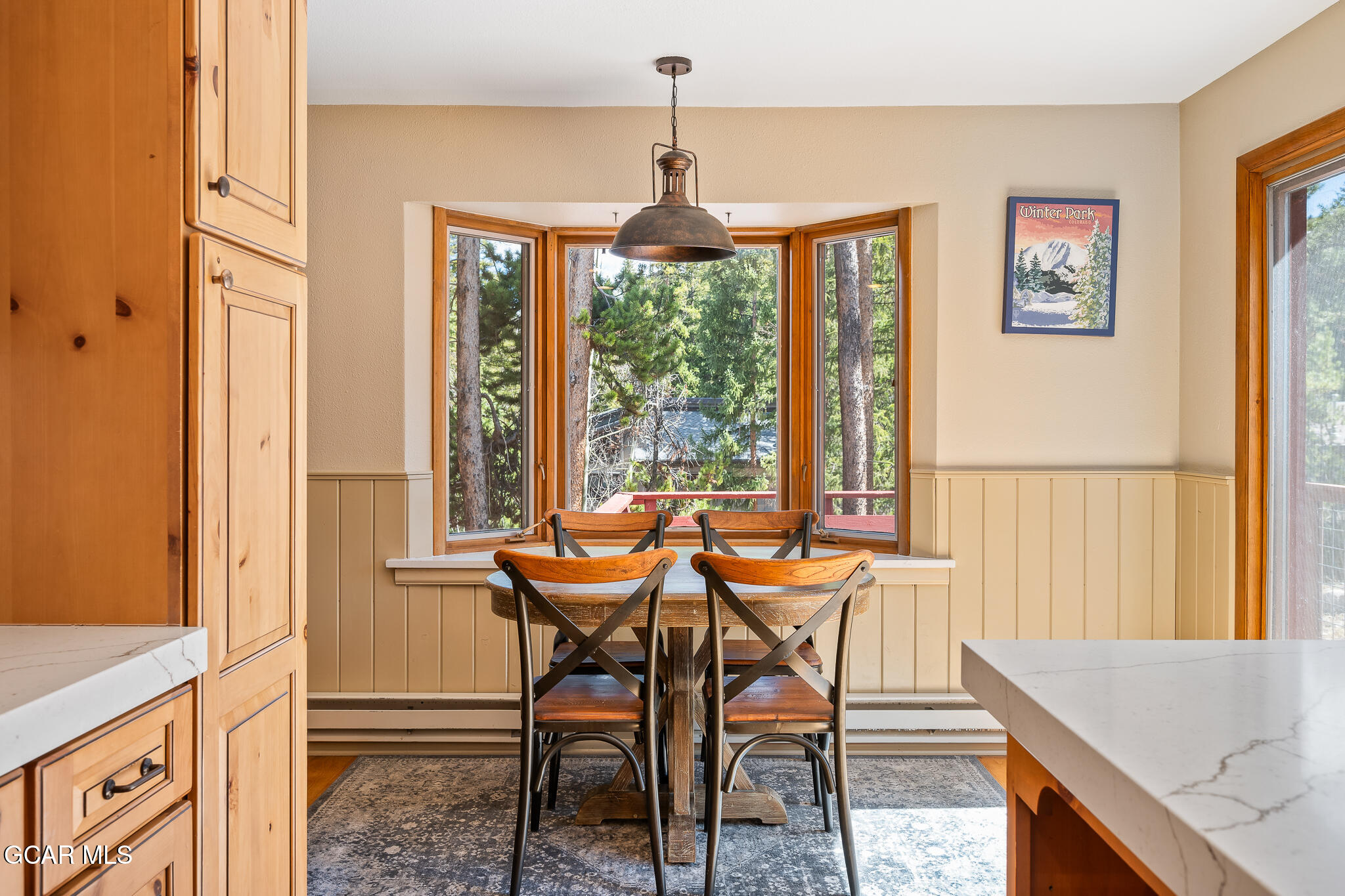 614 Vasquez Road Winter Park, CO 80482 - Photo 15 of 52 a dining room with furniture and window