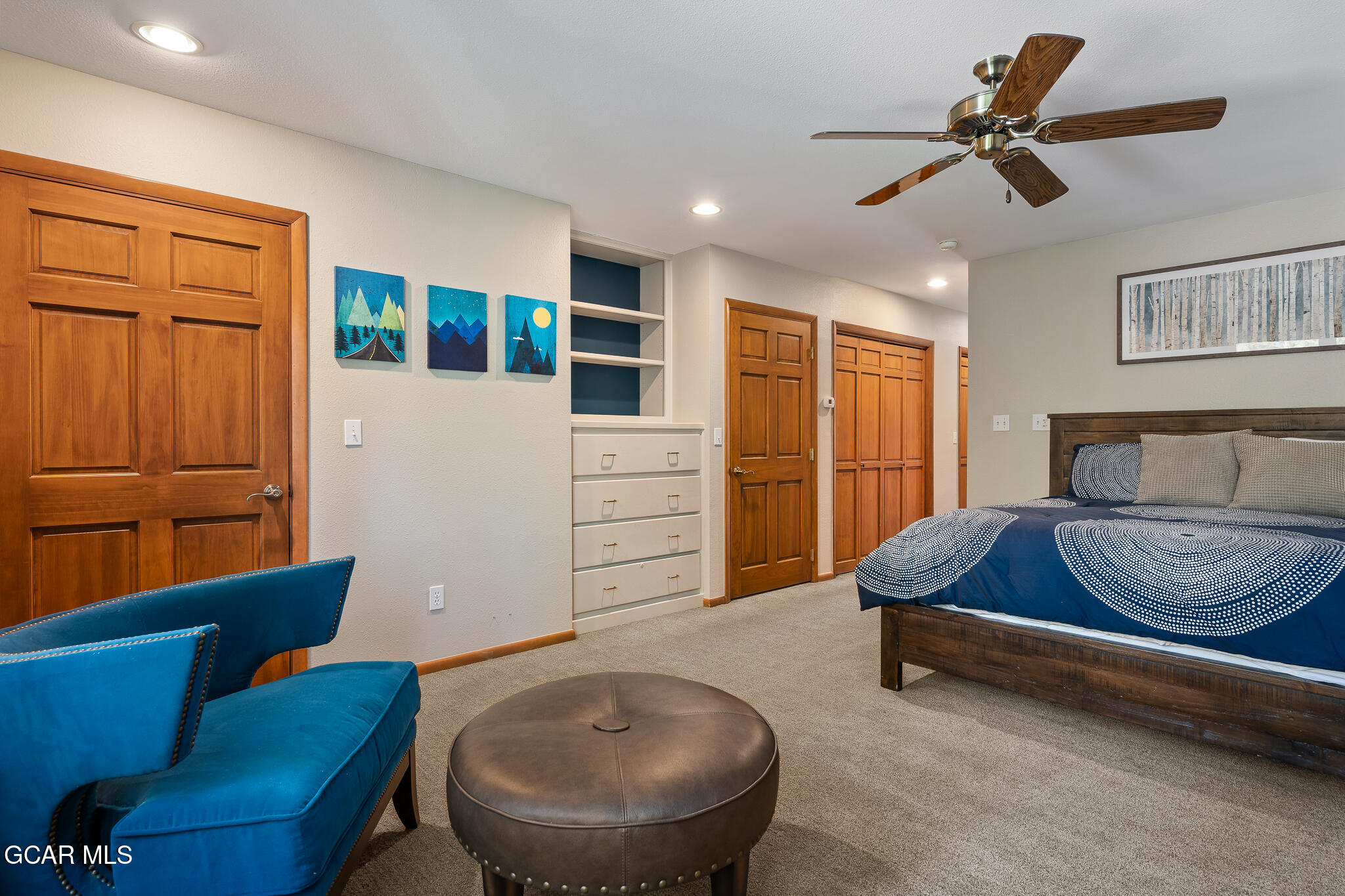 614 Vasquez Road Winter Park, CO 80482 - Photo 23 of 52 a living room with furniture and a chandelier