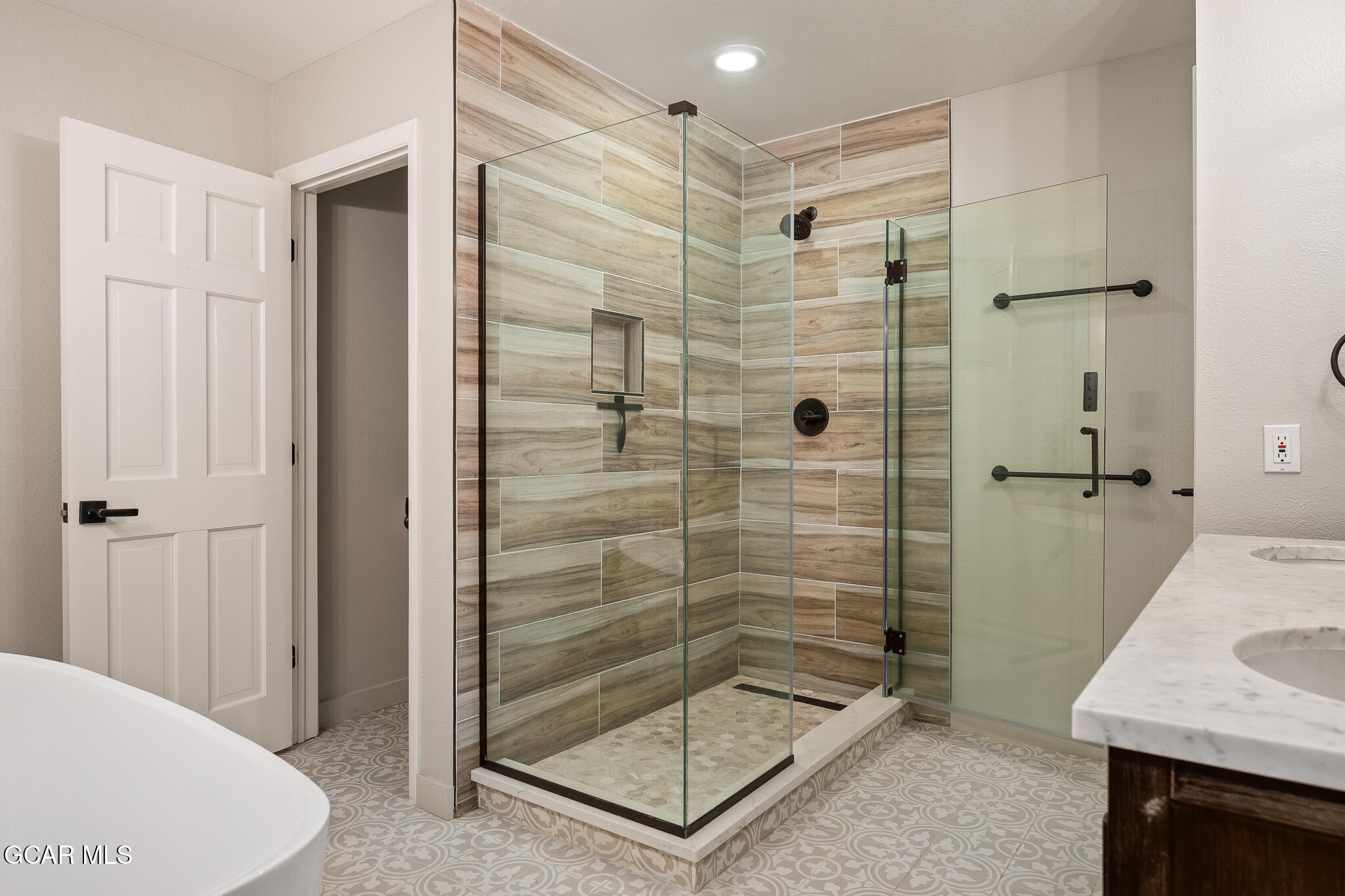 614 Vasquez Road Winter Park, CO 80482 - Photo 25 of 52 a bathroom with a shower and a sink
