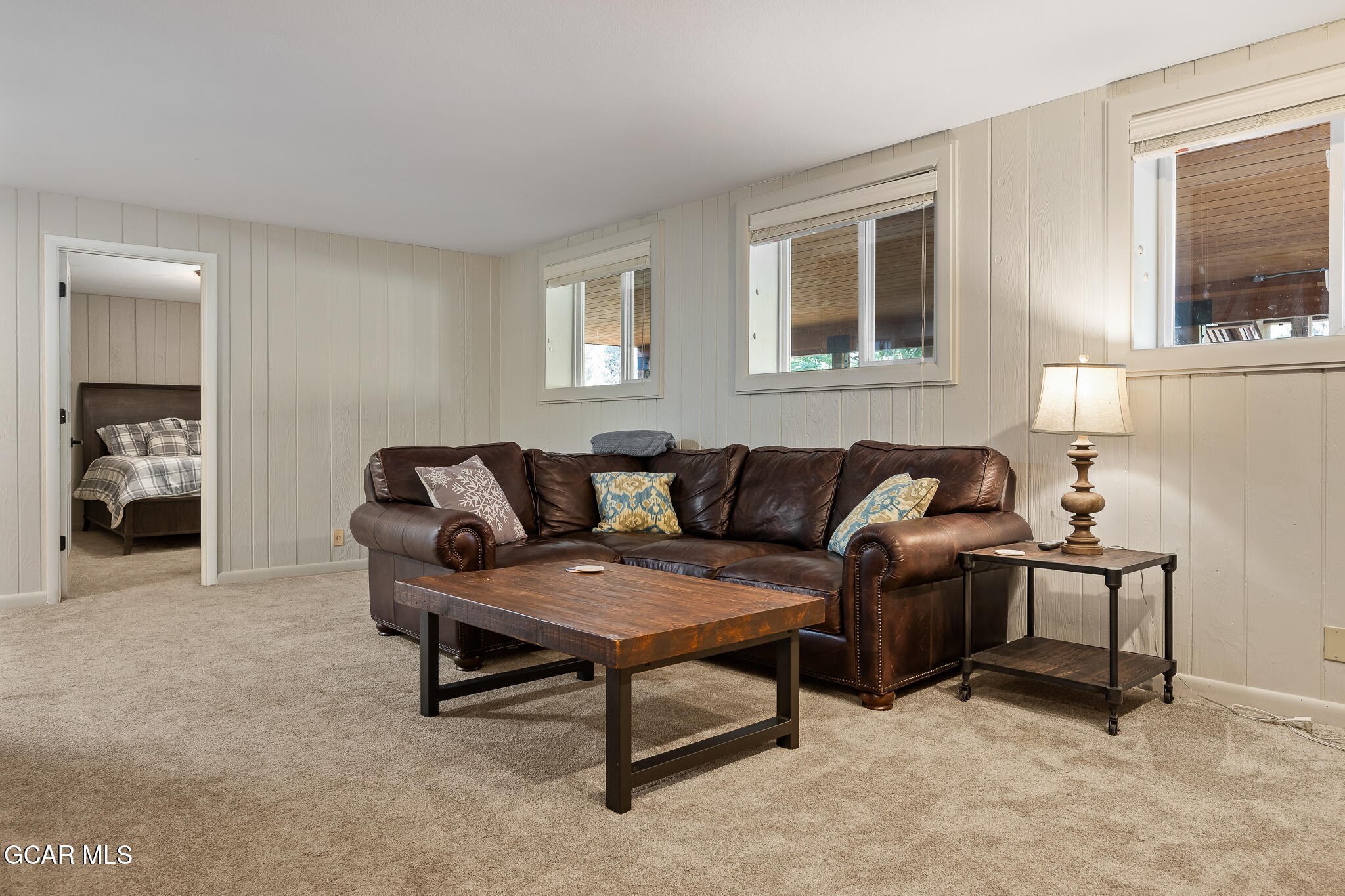 614 Vasquez Road Winter Park, CO 80482 - Photo 27 of 52 a living room with furniture and a window