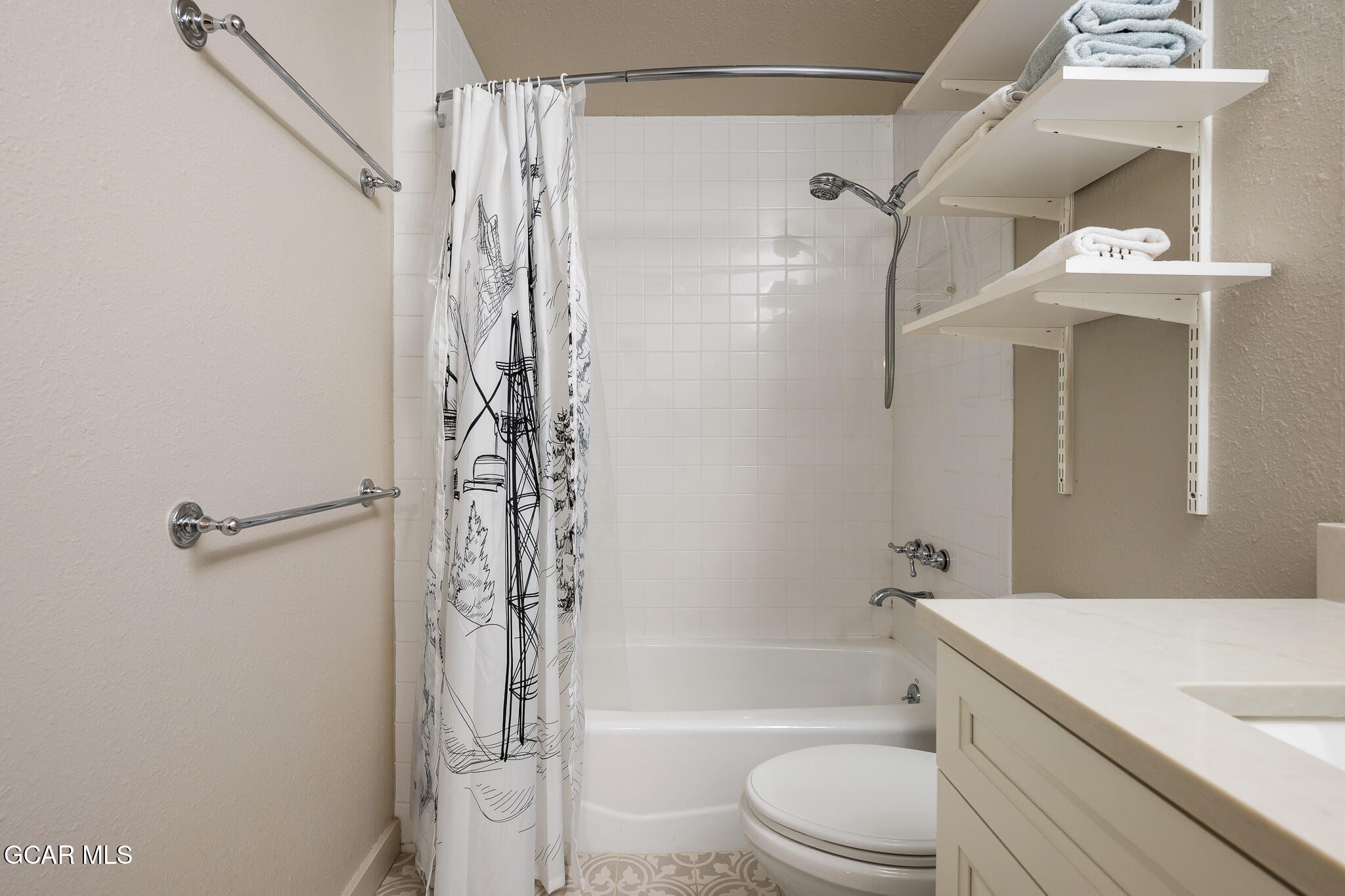 614 Vasquez Road Winter Park, CO 80482 - Photo 32 of 52 a bathroom with a shower a toilet and a sink