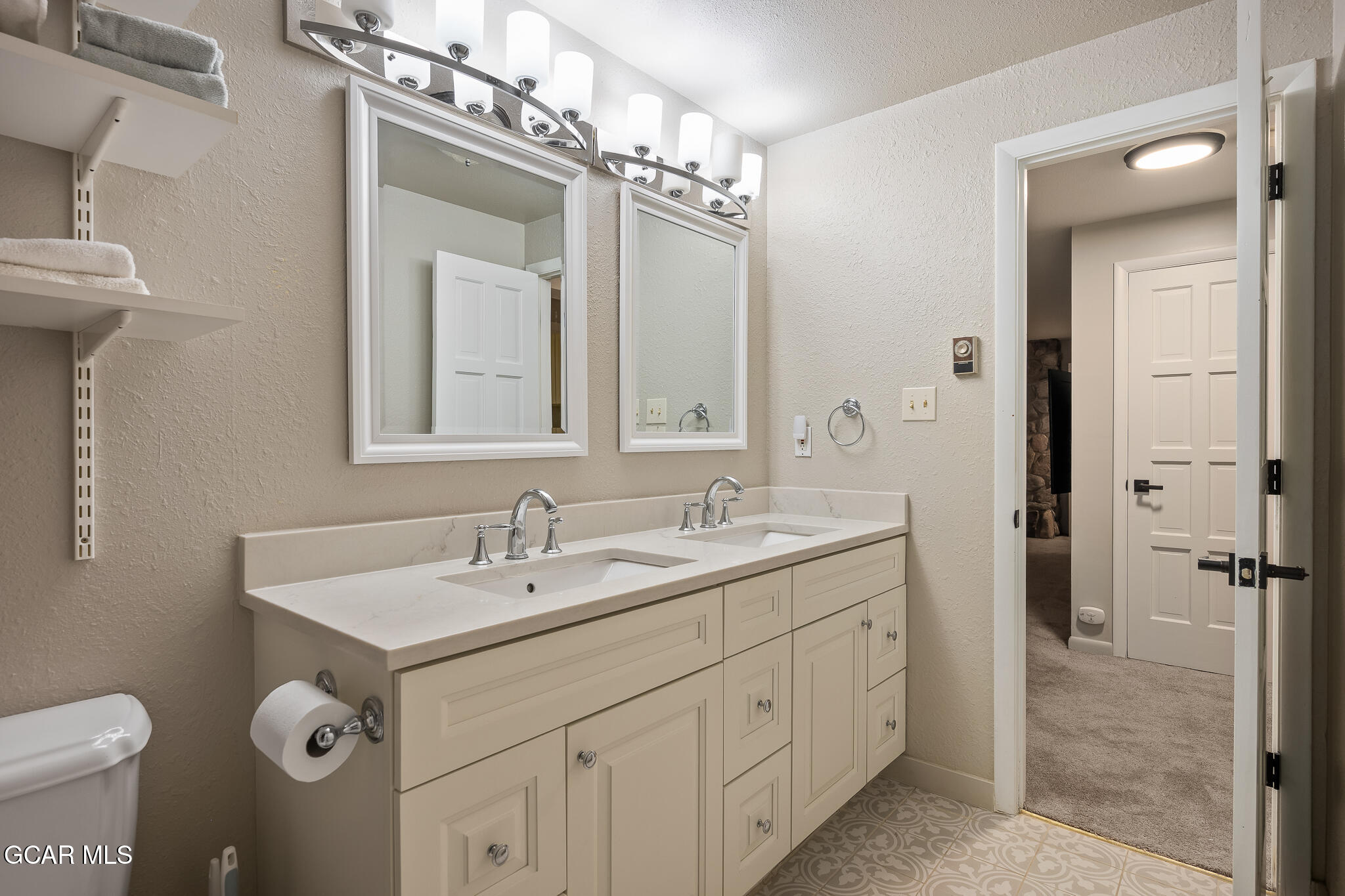 614 Vasquez Road Winter Park, CO 80482 - Photo 33 of 52 a bathroom with a sink a toilet and shower