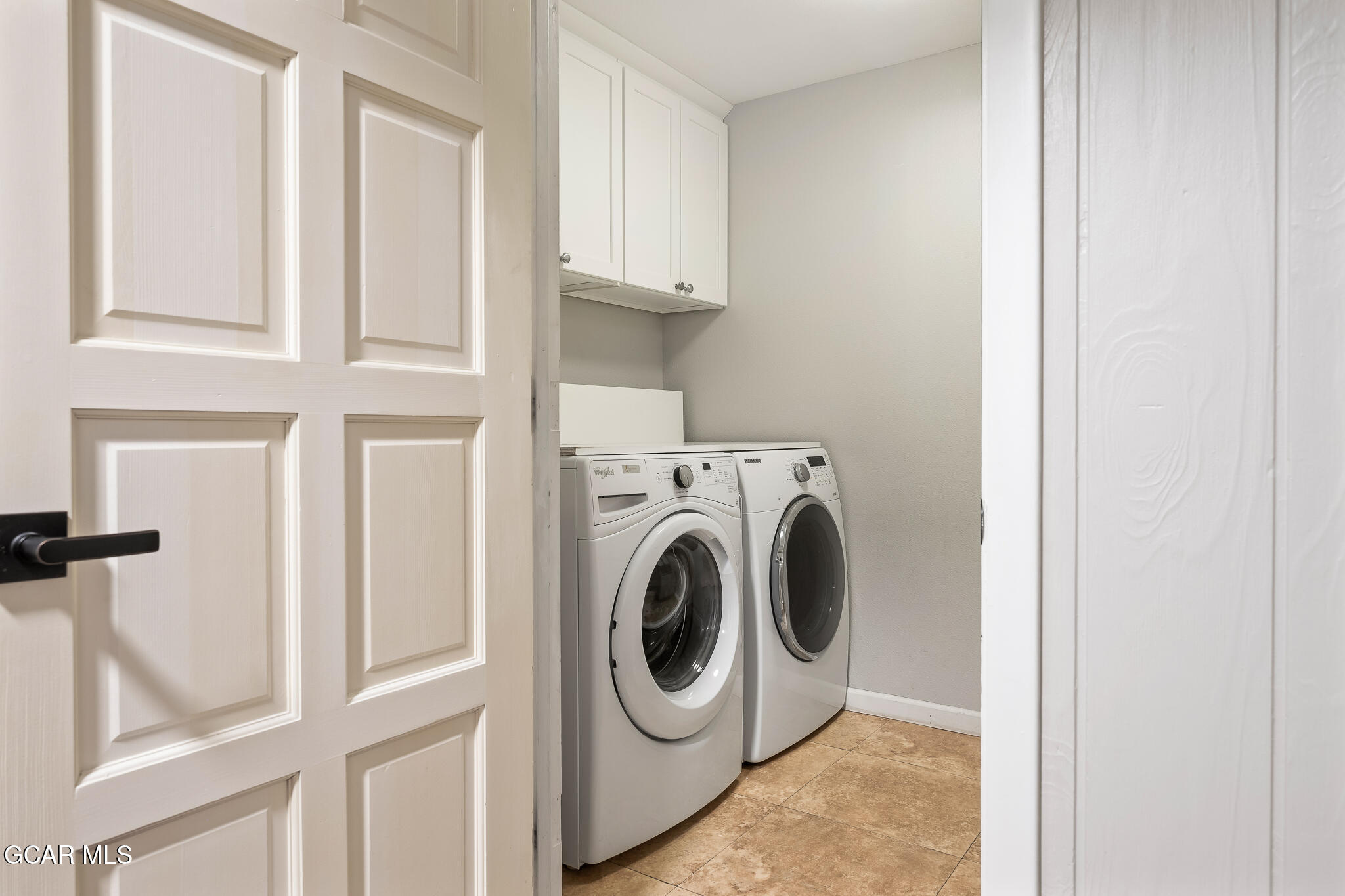 614 Vasquez Road Winter Park, CO 80482 - Photo 35 of 52 a utility room with dryer and washer