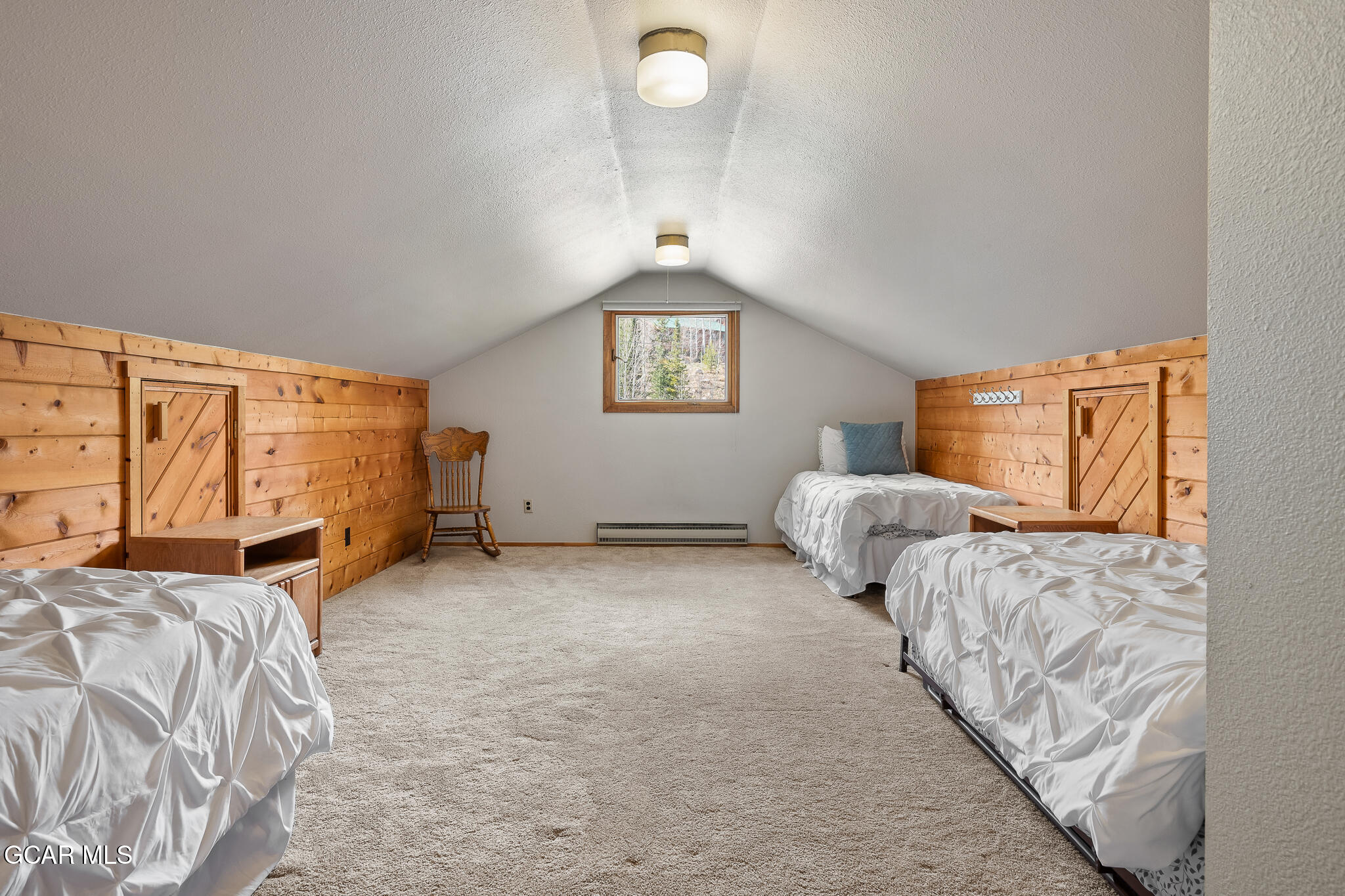 614 Vasquez Road Winter Park, CO 80482 - Photo 38 of 52 a bedroom with bed and window