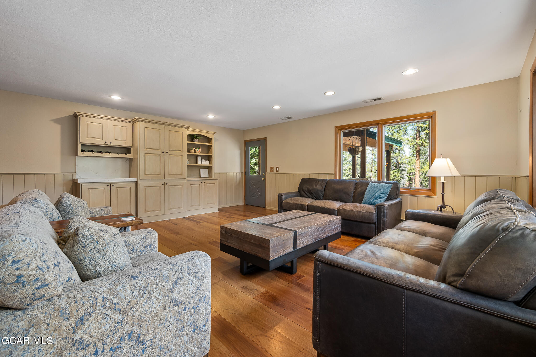 614 Vasquez Road Winter Park, CO 80482 - Photo 4 of 52 a living room with furniture and a large window