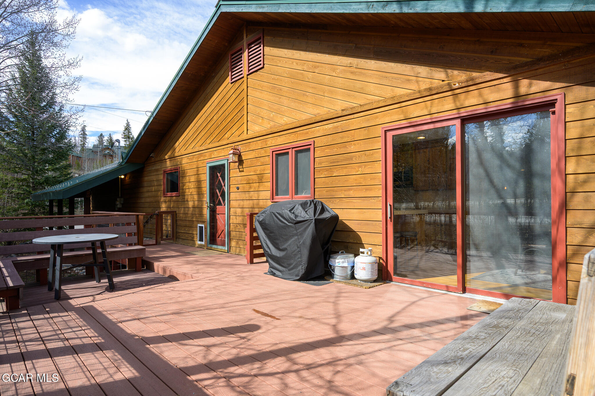 614 Vasquez Road Winter Park, CO 80482 - Photo 43 of 52 a backyard of a house with seating space
