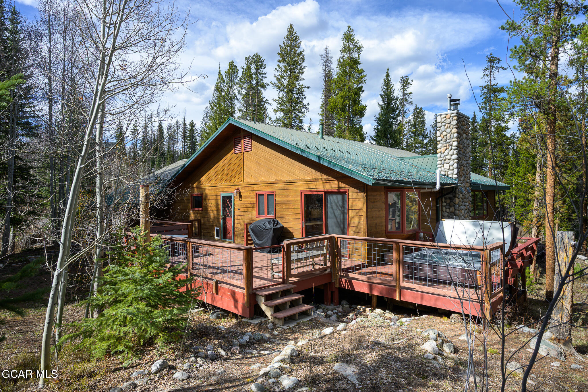 614 Vasquez Road Winter Park, CO 80482 - Photo 44 of 52 a front view of a house with a yard