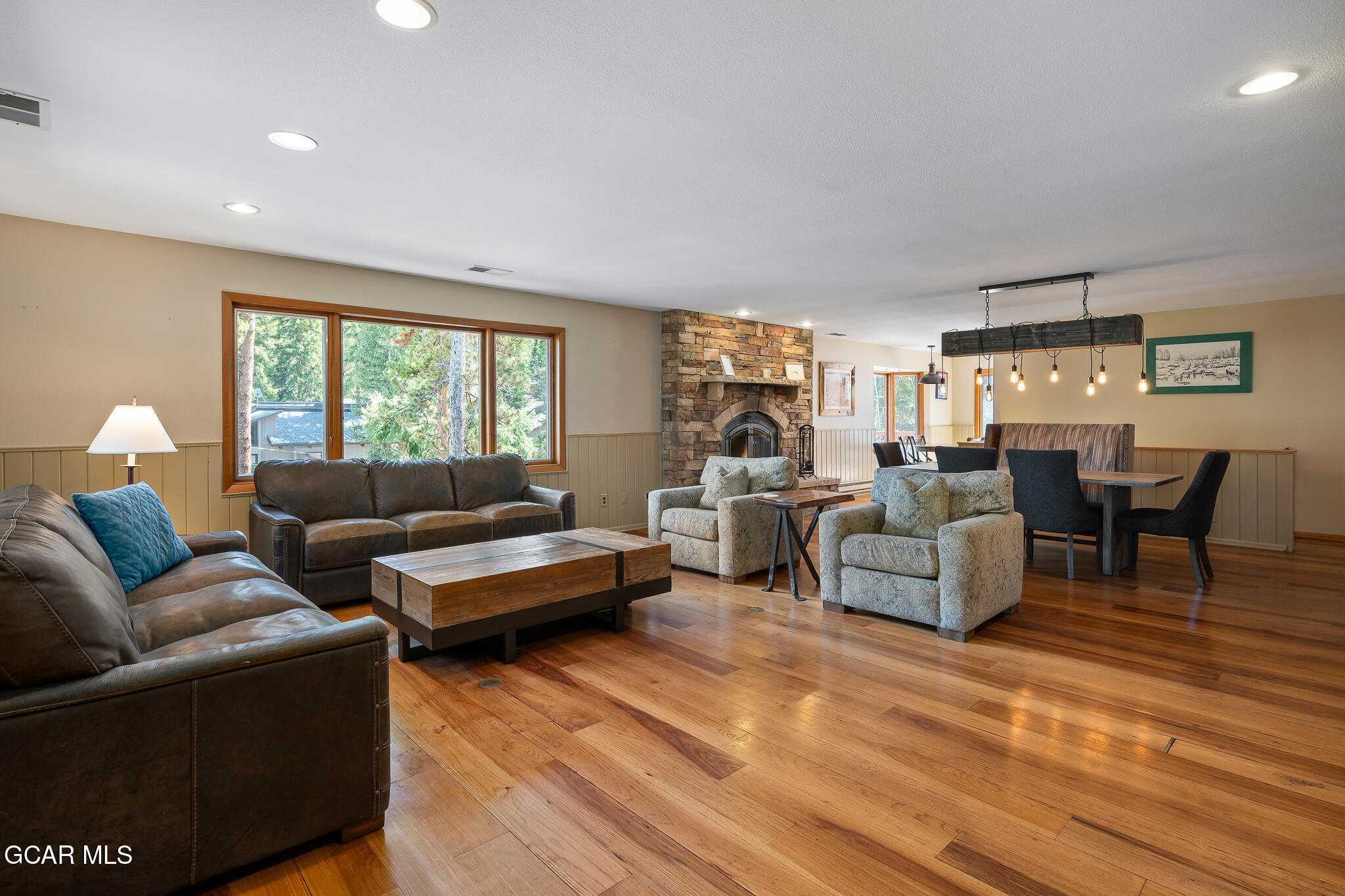 614 Vasquez Road Winter Park, CO 80482 - Photo 6 of 52 a living room with furniture and large windows