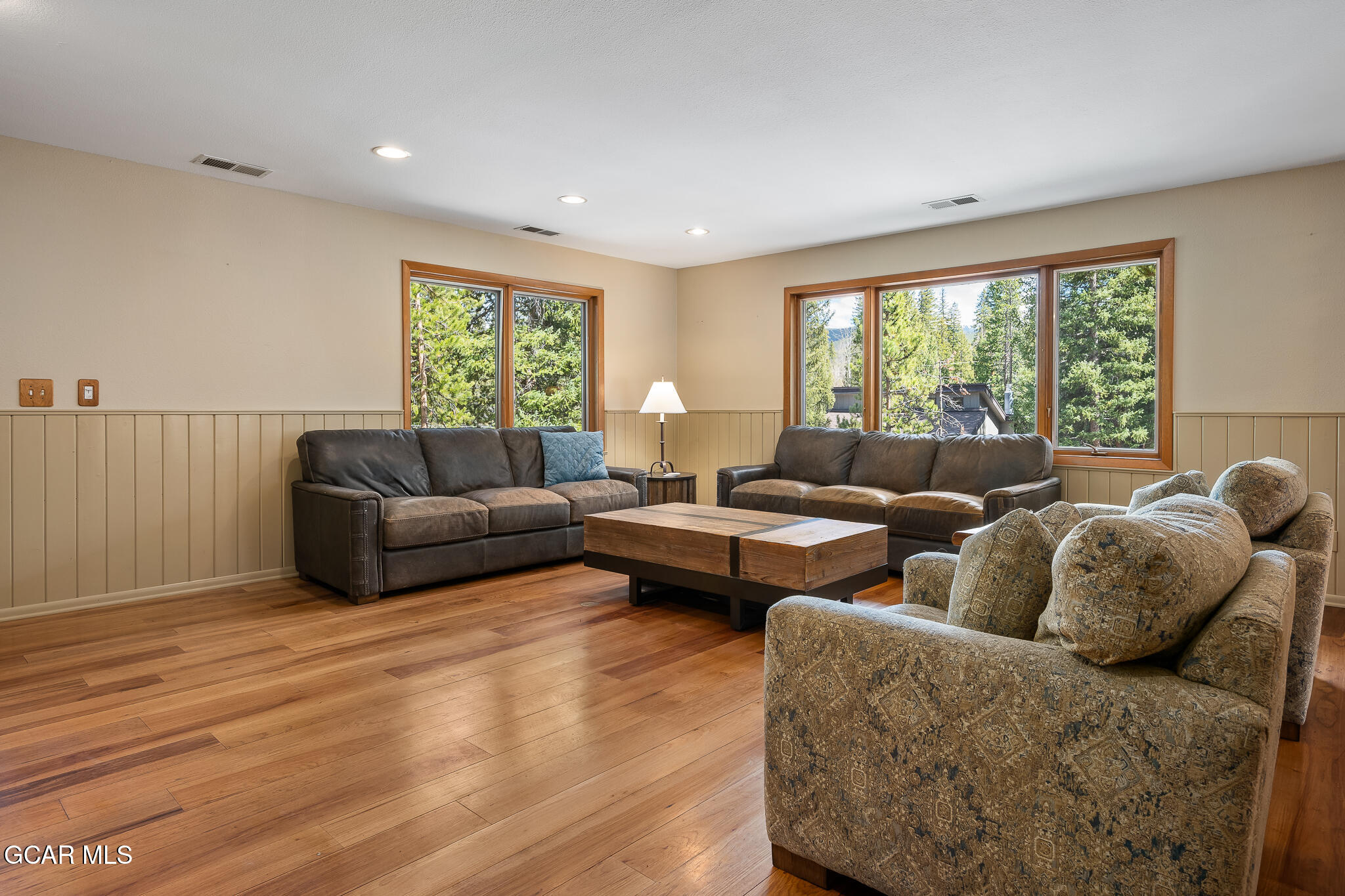 614 Vasquez Road Winter Park, CO 80482 - Photo 7 of 52 a living room with furniture and a large window