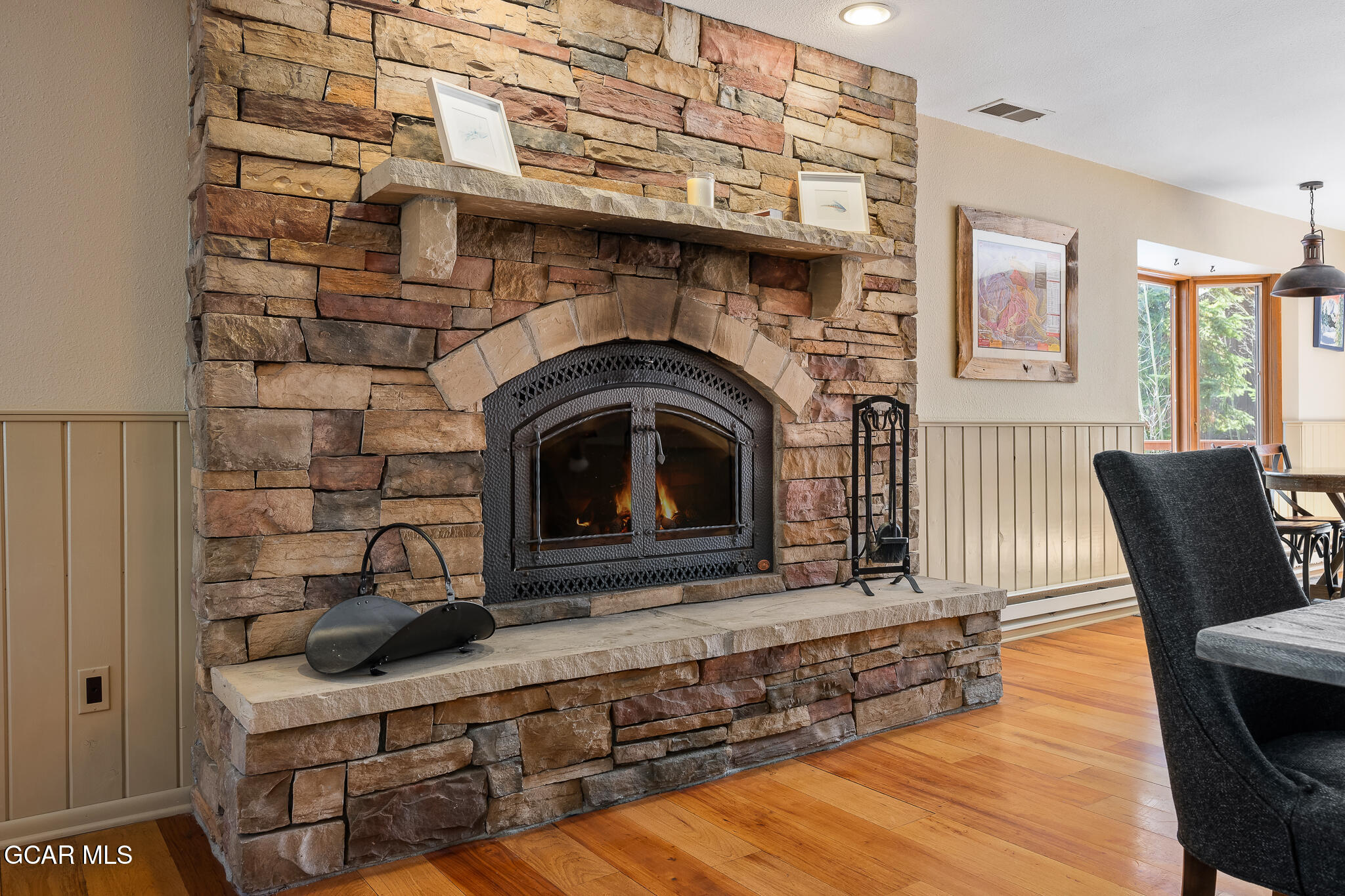 614 Vasquez Road Winter Park, CO 80482 - Photo 8 of 52 a living room with furniture and a fireplace