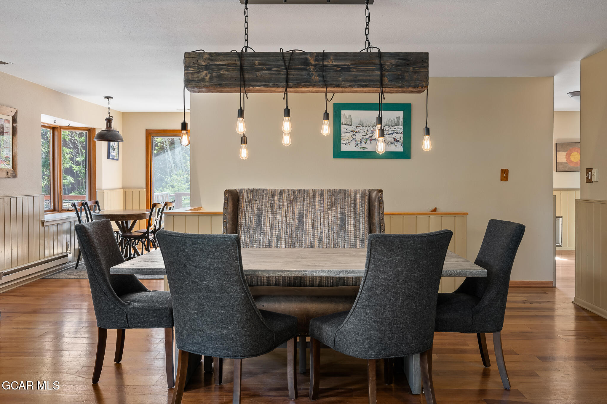 614 Vasquez Road Winter Park, CO 80482 - Photo 10 of 52 a view of a dining room with furniture and wooden floor