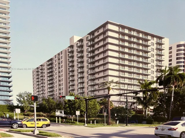 a view of a building with a street