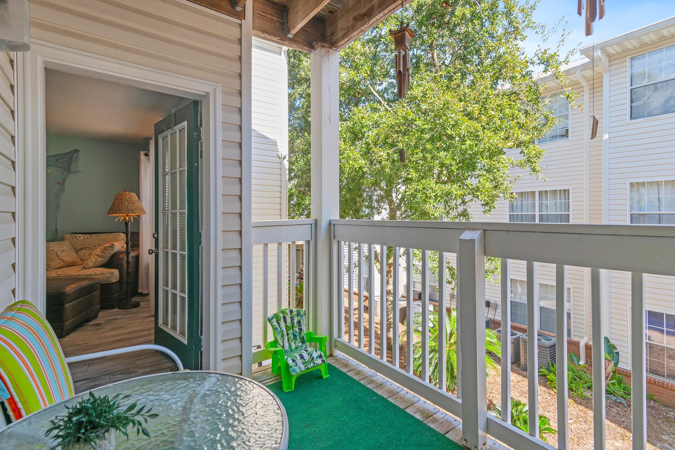 4010 Dancing Cloud Court, Unit 404 Destin, FL 32541 - Photo 23 of 44 a view of a porch