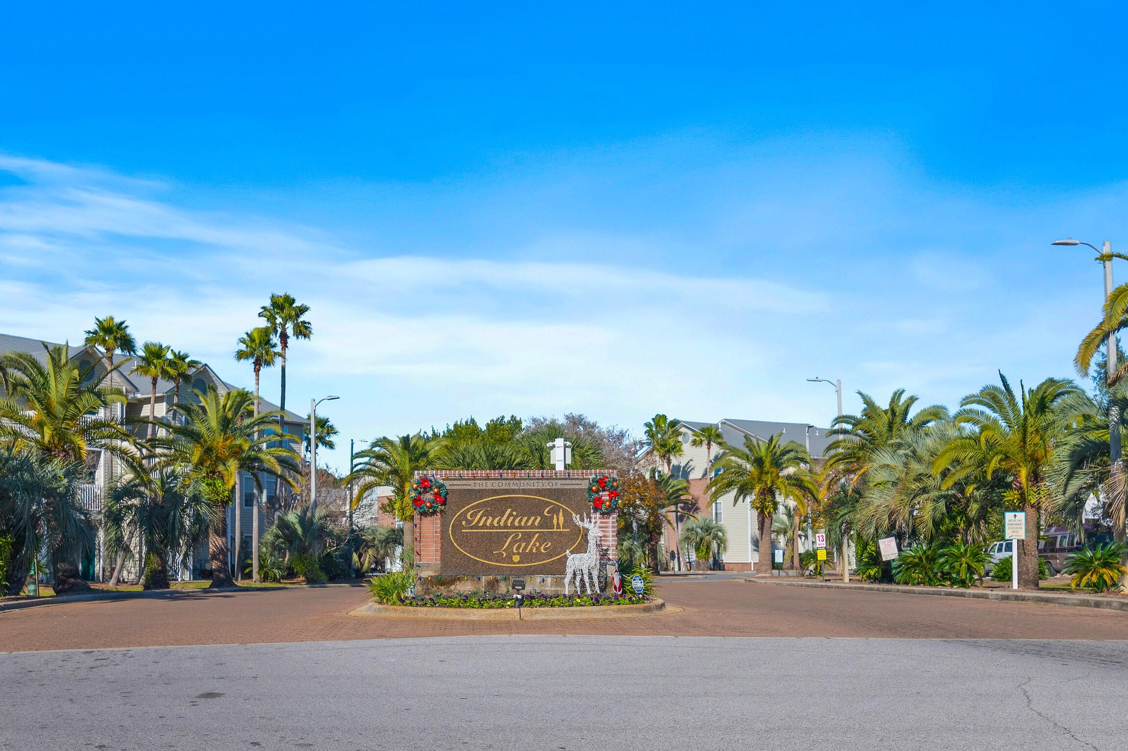 4010 Dancing Cloud Court, Unit 404 Destin, FL 32541 - Photo 24 of 44 a road view with a building in the background
