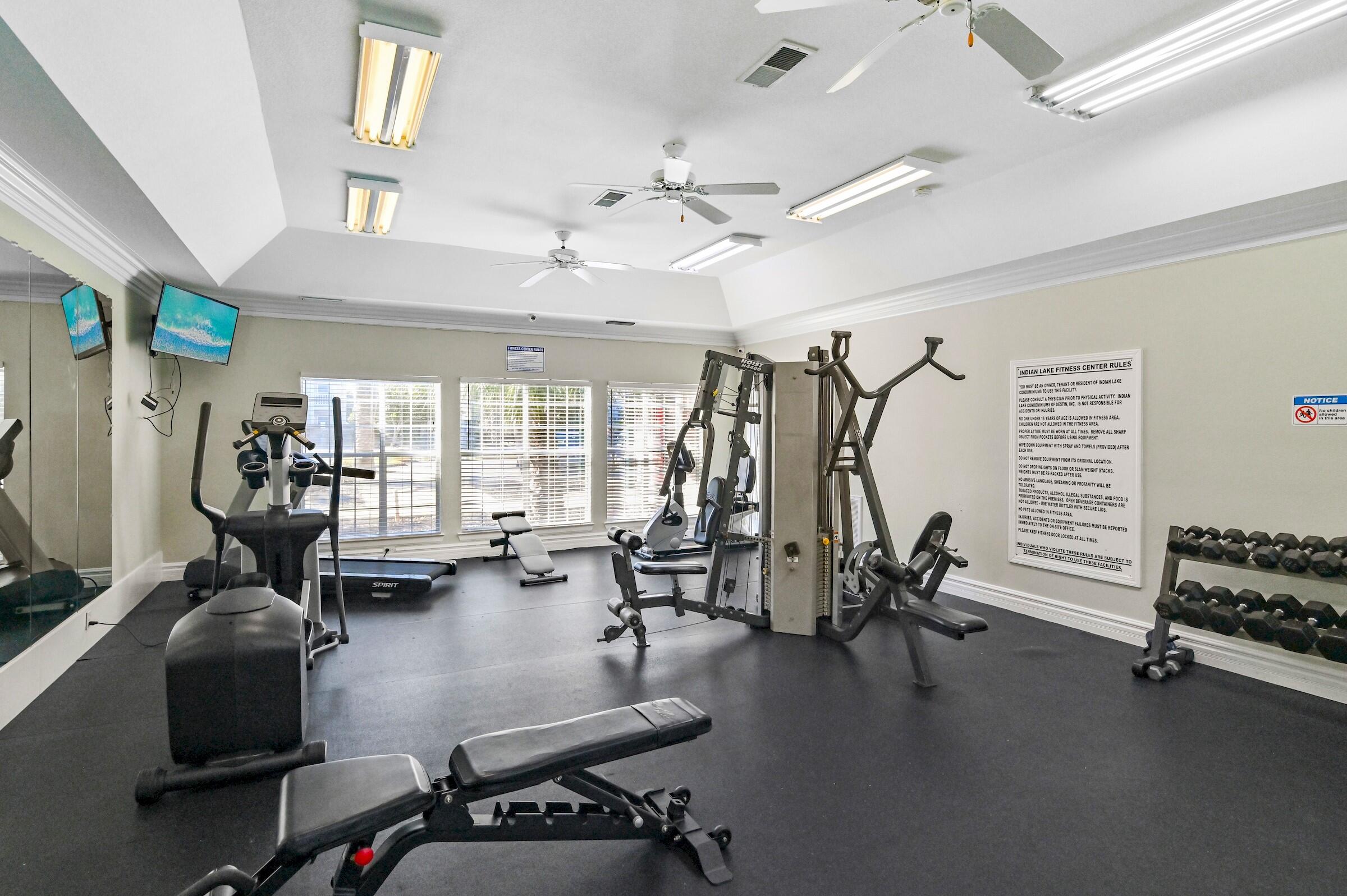 4010 Dancing Cloud Court, Unit 404 Destin, FL 32541 - Photo 25 of 44 a view of a room with gym equipment