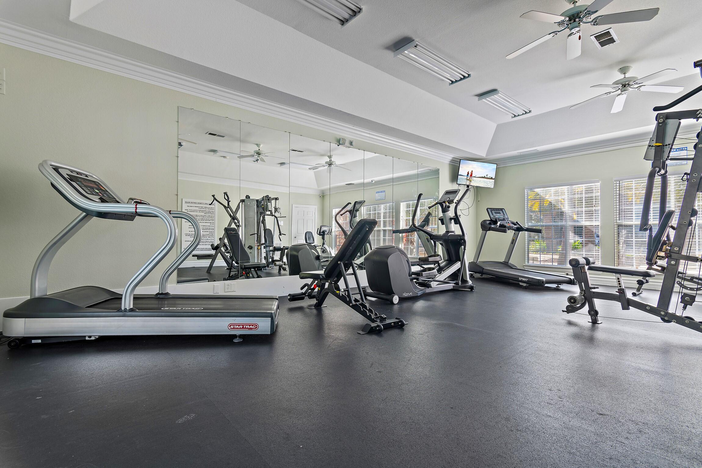 4010 Dancing Cloud Court, Unit 404 Destin, FL 32541 - Photo 26 of 44 a view of a room with gym equipment