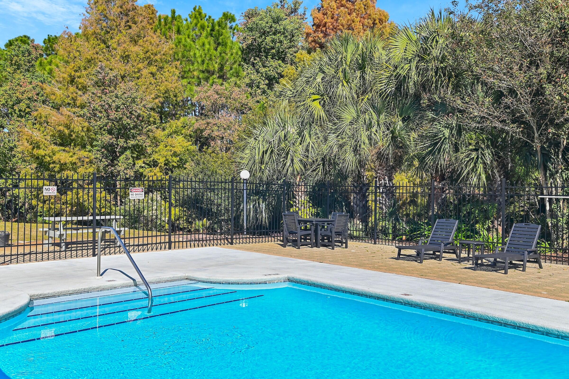 4010 Dancing Cloud Court, Unit 404 Destin, FL 32541 - Photo 27 of 44 a park view with large trees