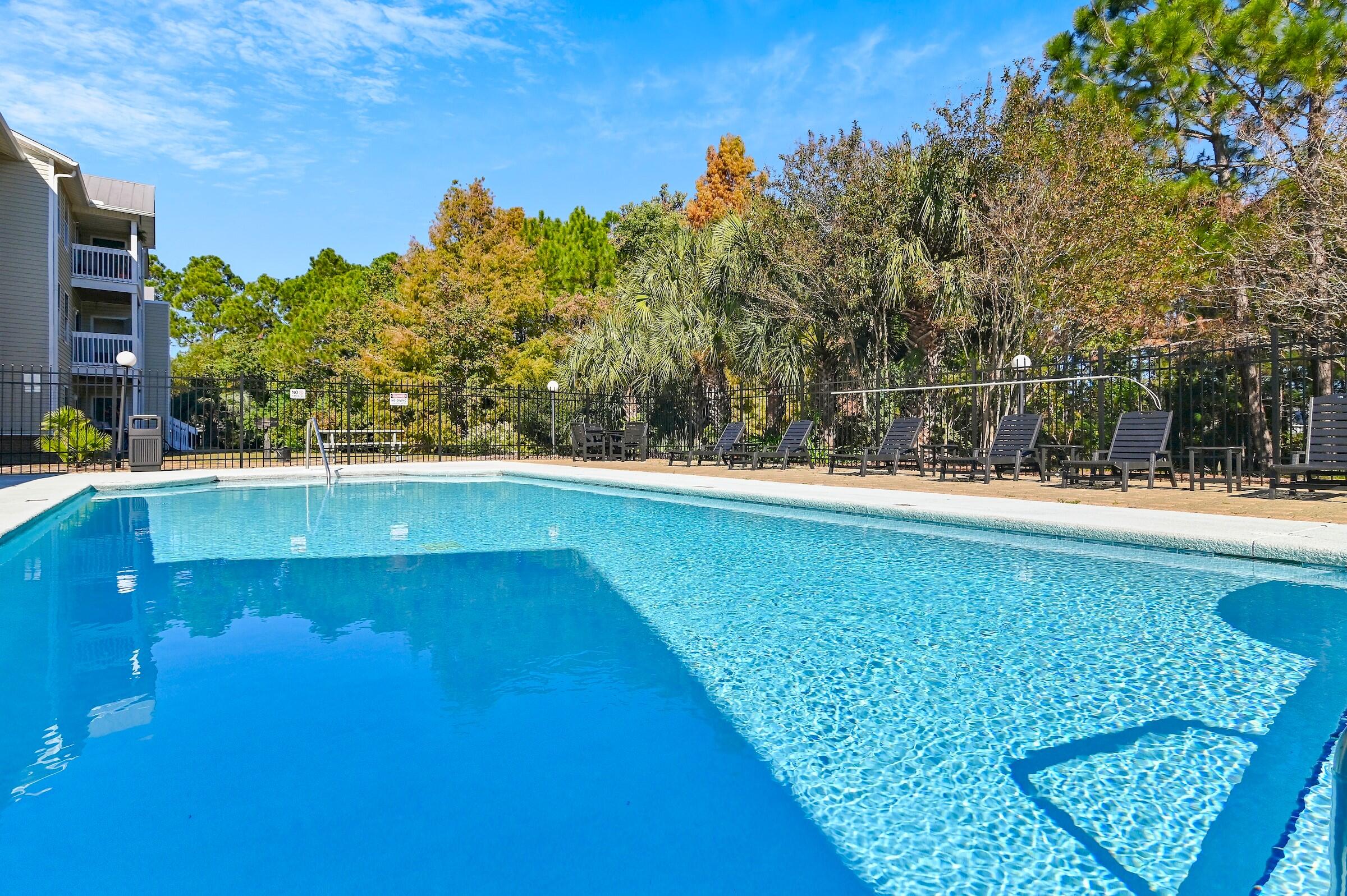 4010 Dancing Cloud Court, Unit 404 Destin, FL 32541 - Photo 29 of 44 a view of swimming pool with a yard