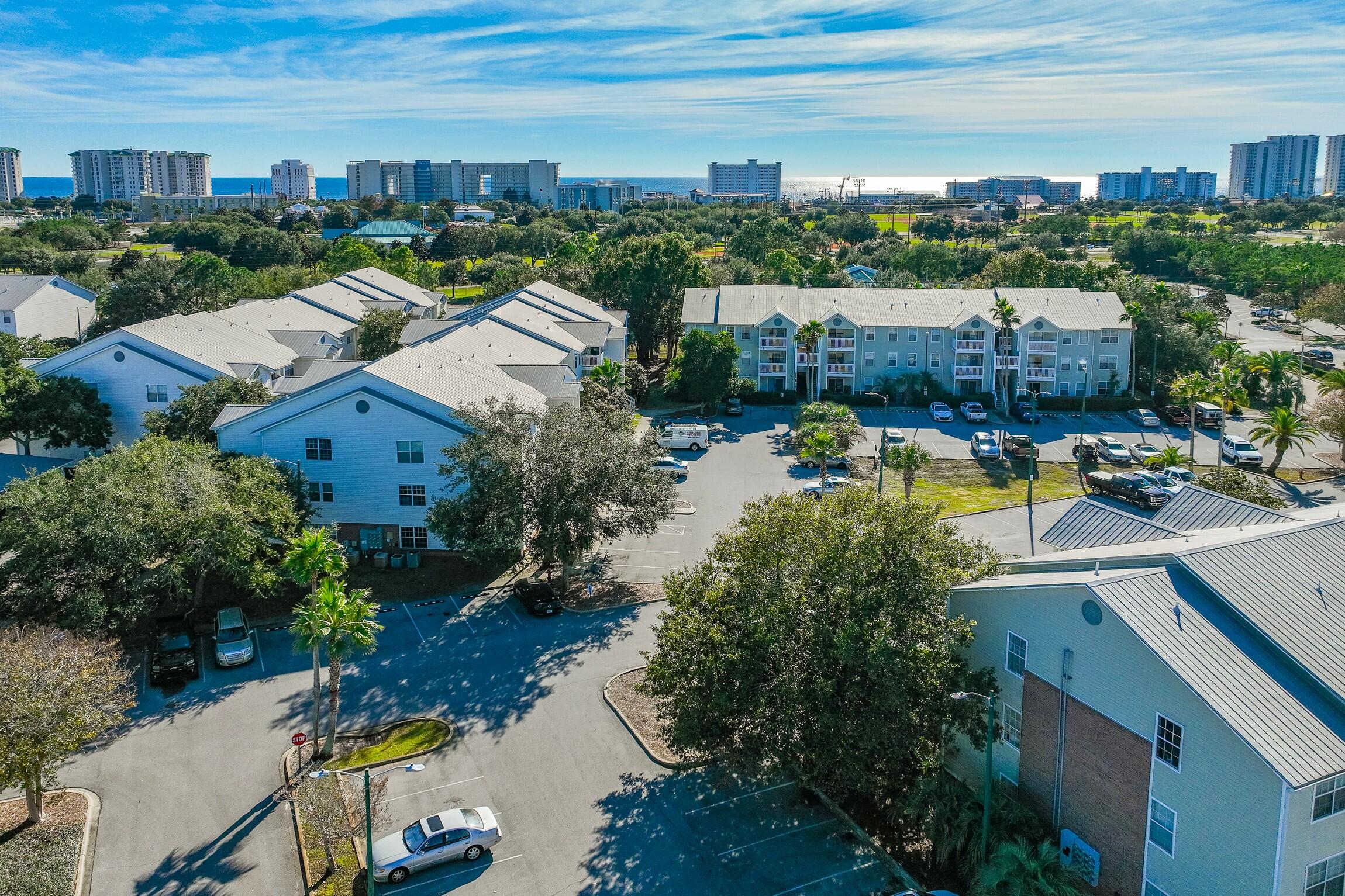 4010 Dancing Cloud Court, Unit 404 Destin, FL 32541 - Photo 32 of 44 an aerial view of a house with a garden view