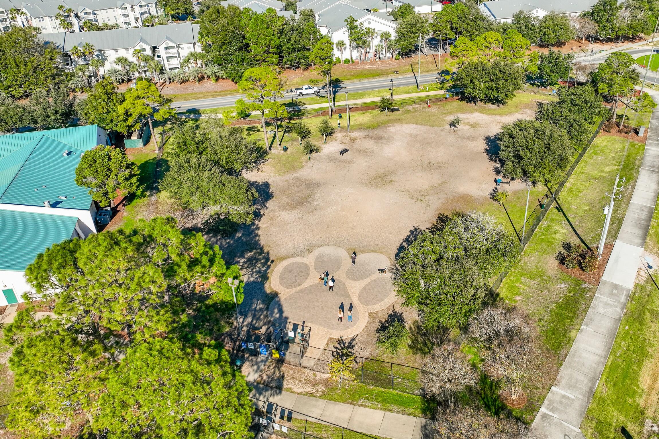 4010 Dancing Cloud Court, Unit 404 Destin, FL 32541 - Photo 41 of 44 an aerial view of a houses with yard
