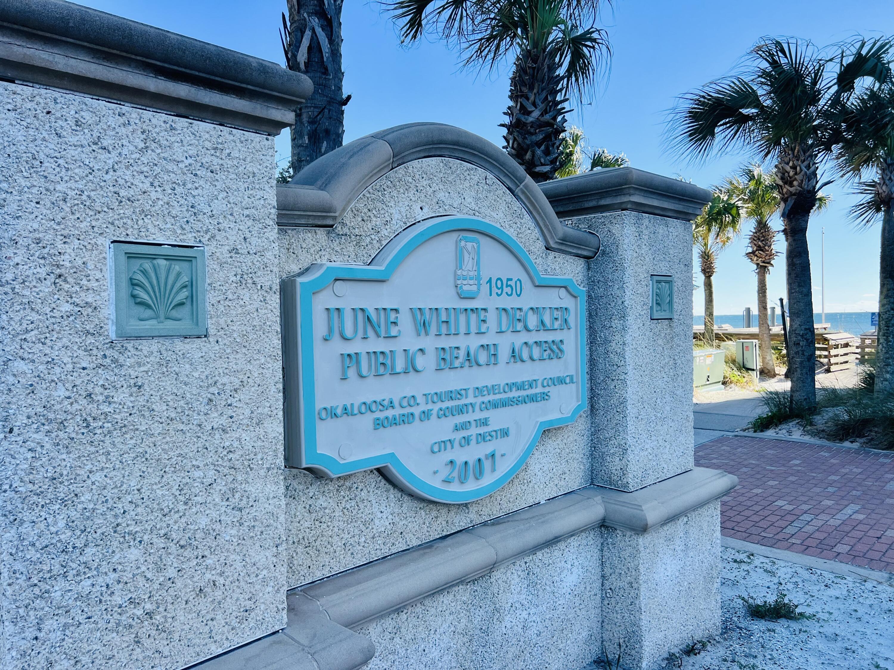 4010 Dancing Cloud Court, Unit 404 Destin, FL 32541 - Photo 42 of 44 a front view of a house with garden