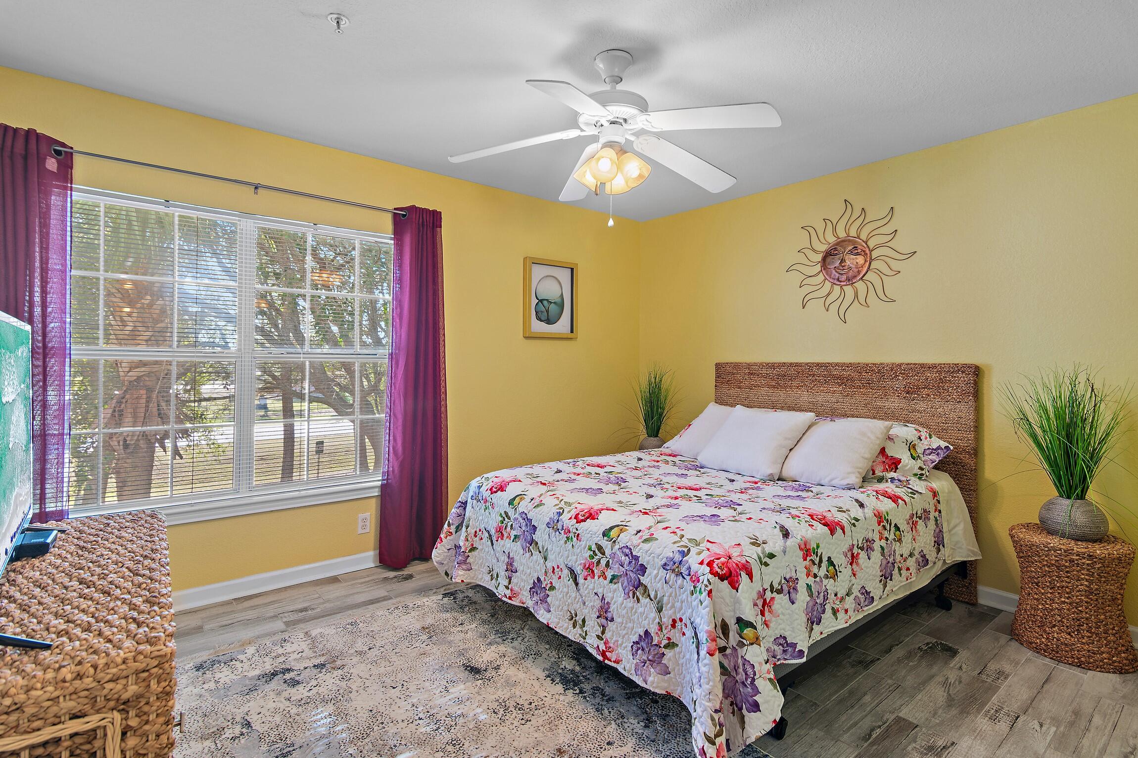 4010 Dancing Cloud Court, Unit 404 Destin, FL 32541 - Photo 9 of 44 a bedroom with a bed and a window