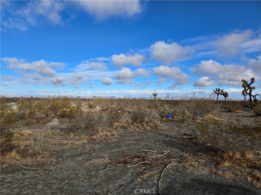 0 Palmdale Road Phelan, CA 92371 - Photo 3 of 7 a view of a city with lush green forest