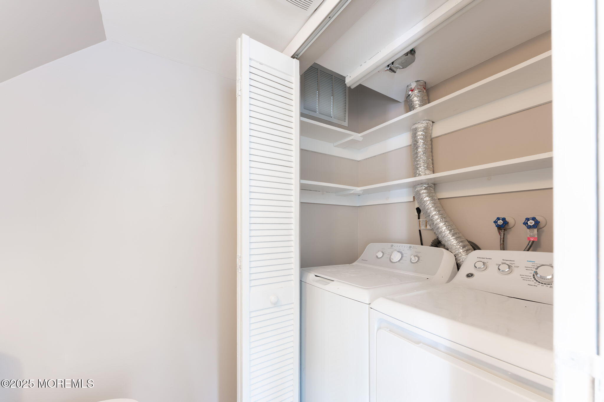 156 Greenwood Loop Road Brick, NJ 08724 - Photo 11 of 22 a utility room with dryer and washer