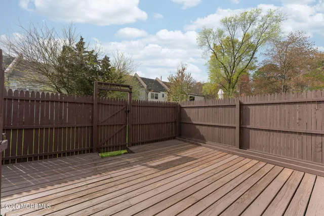a view of a wooden roof deck