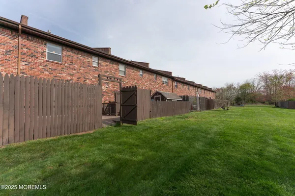 a view of a back yard of the house