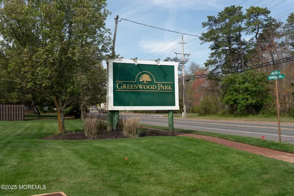 a sign on the side of the road