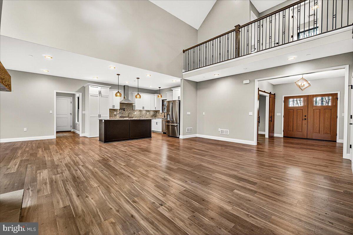 16080 Kelbaugh Road Thurmont, MD 21788 - Photo 11 of 56 a view of empty room with wooden floor