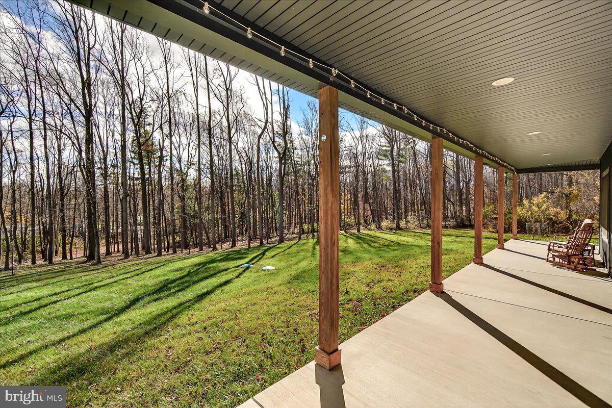 16080 Kelbaugh Road Thurmont, MD 21788 - Photo 44 of 56 a view of a backyard with garden