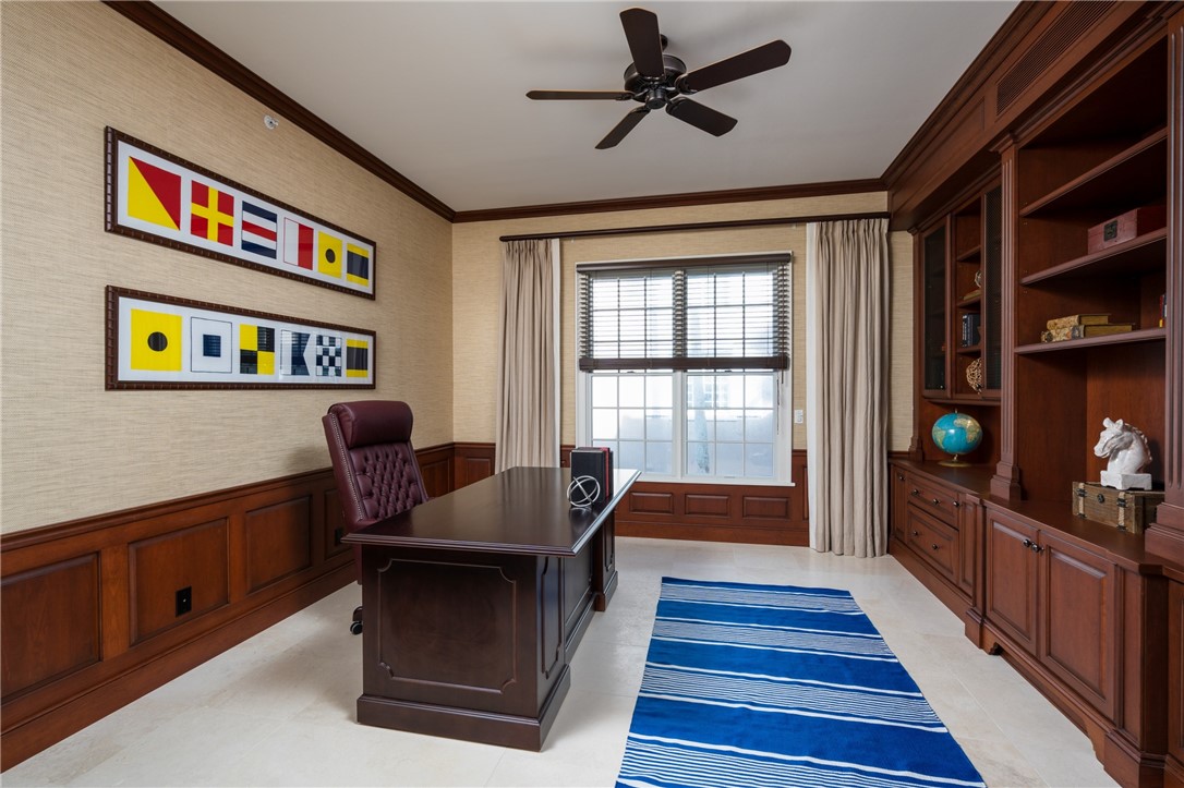 90 Beachside Drive, Unit 101 Vero Beach, FL 32963 - Photo 24 of 29 a living room with furniture and a gate