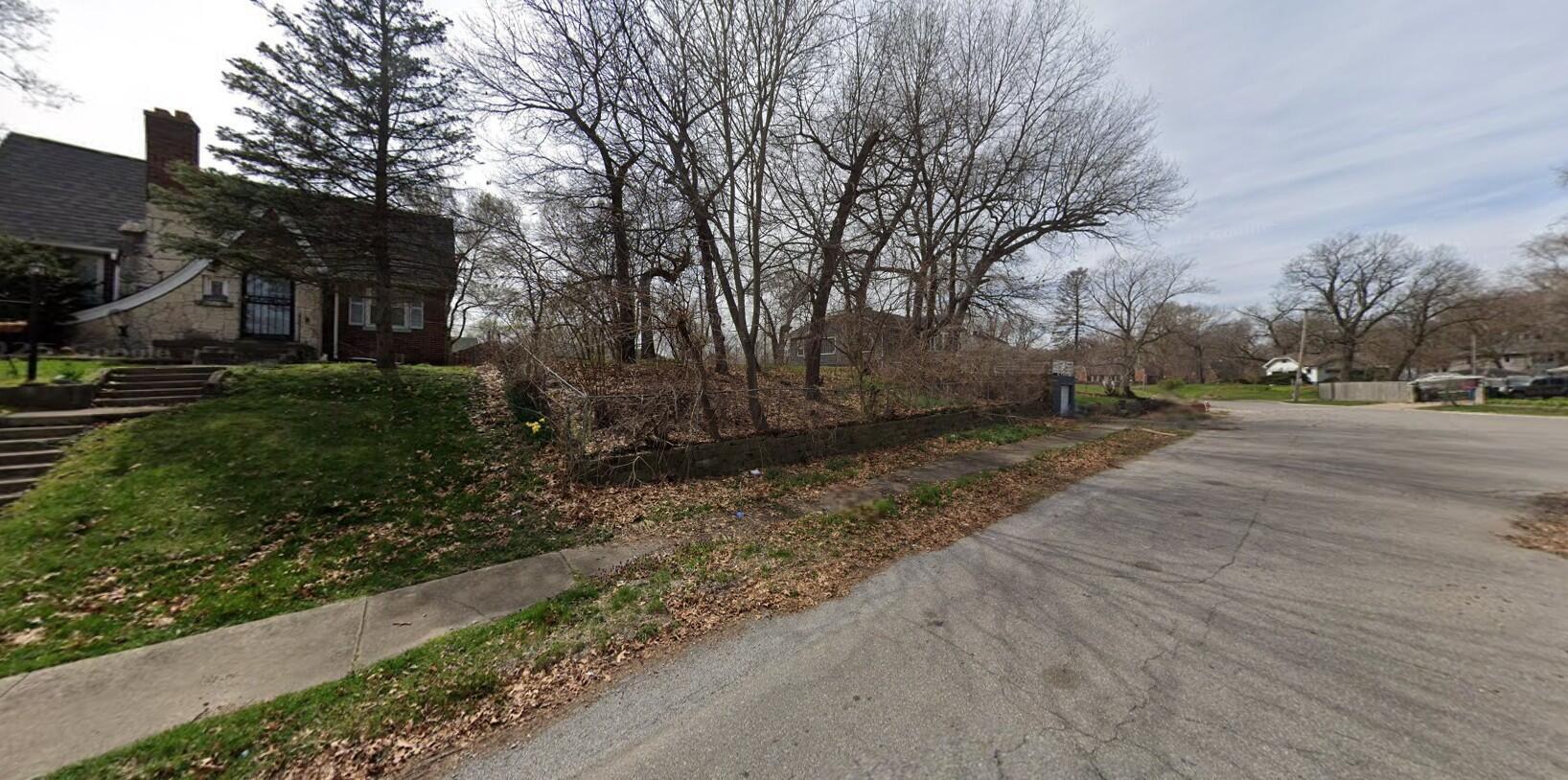 3701 East 12th Place Gary, IN 46403 - Photo 2 of 7 a view of a yard with plants and trees