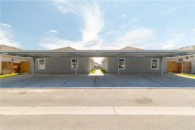 a front view of a house with a garage