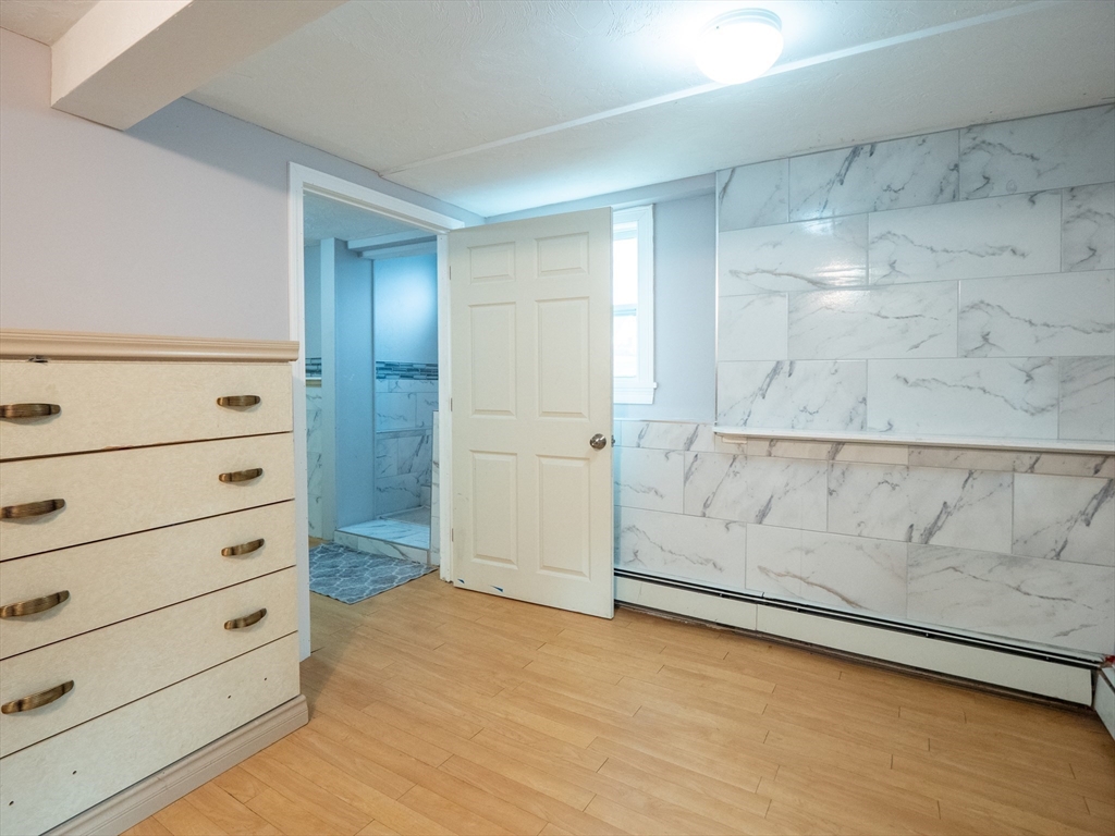 51 Lancaster Road Dedham, MA 02026 - Photo 33 of 41 a view of wooden cabinets