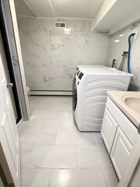 51 Lancaster Road Dedham, MA 02026 - Photo 39 of 41 a utility room with dryer and washer