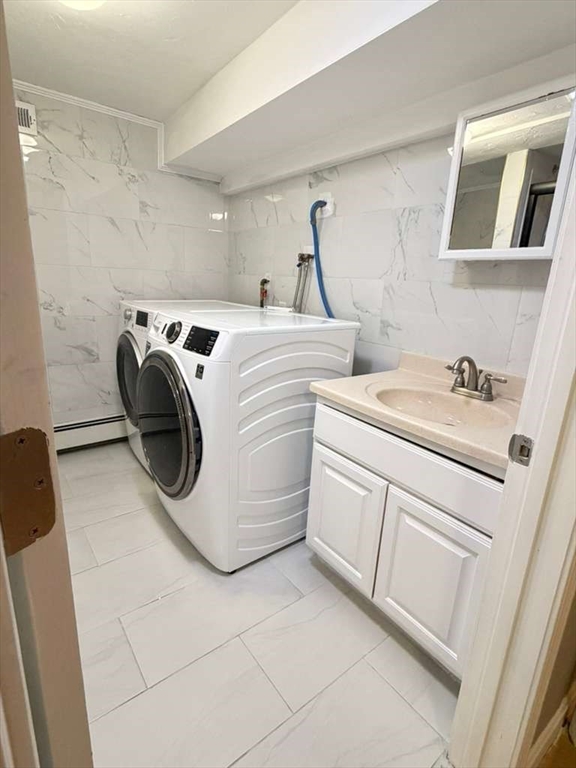 51 Lancaster Road Dedham, MA 02026 - Photo 40 of 41 a utility room with dryer and washer