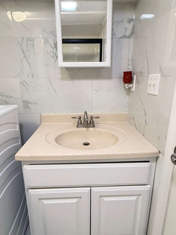 51 Lancaster Road Dedham, MA 02026 - Photo 41 of 41 a close view of sink and tap