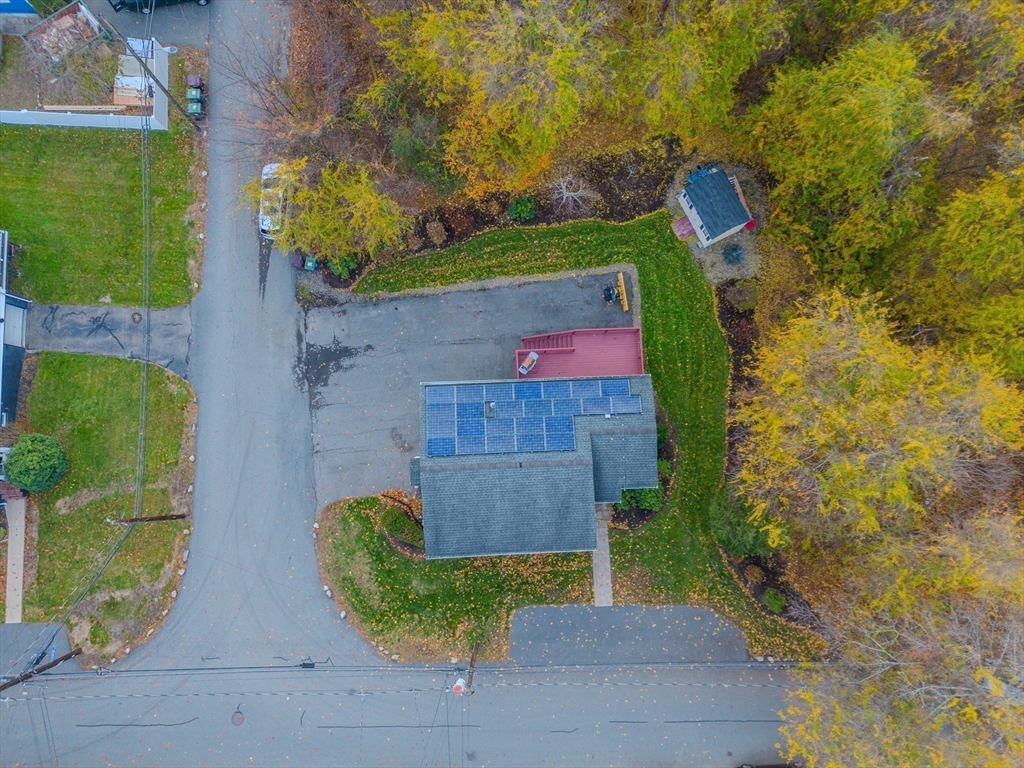 51 Lancaster Road Dedham, MA 02026 - Photo 9 of 41 an aerial view of a house with outdoor space